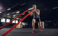 young-healthy-man-athlete-doing-exercise-with-ropes-gym-single-male-model-practicing-hard-training-his-upper-body-concept-healthy-lifestyle-sport-fitness-bodybuilding-wellbeing_155003-27879.png